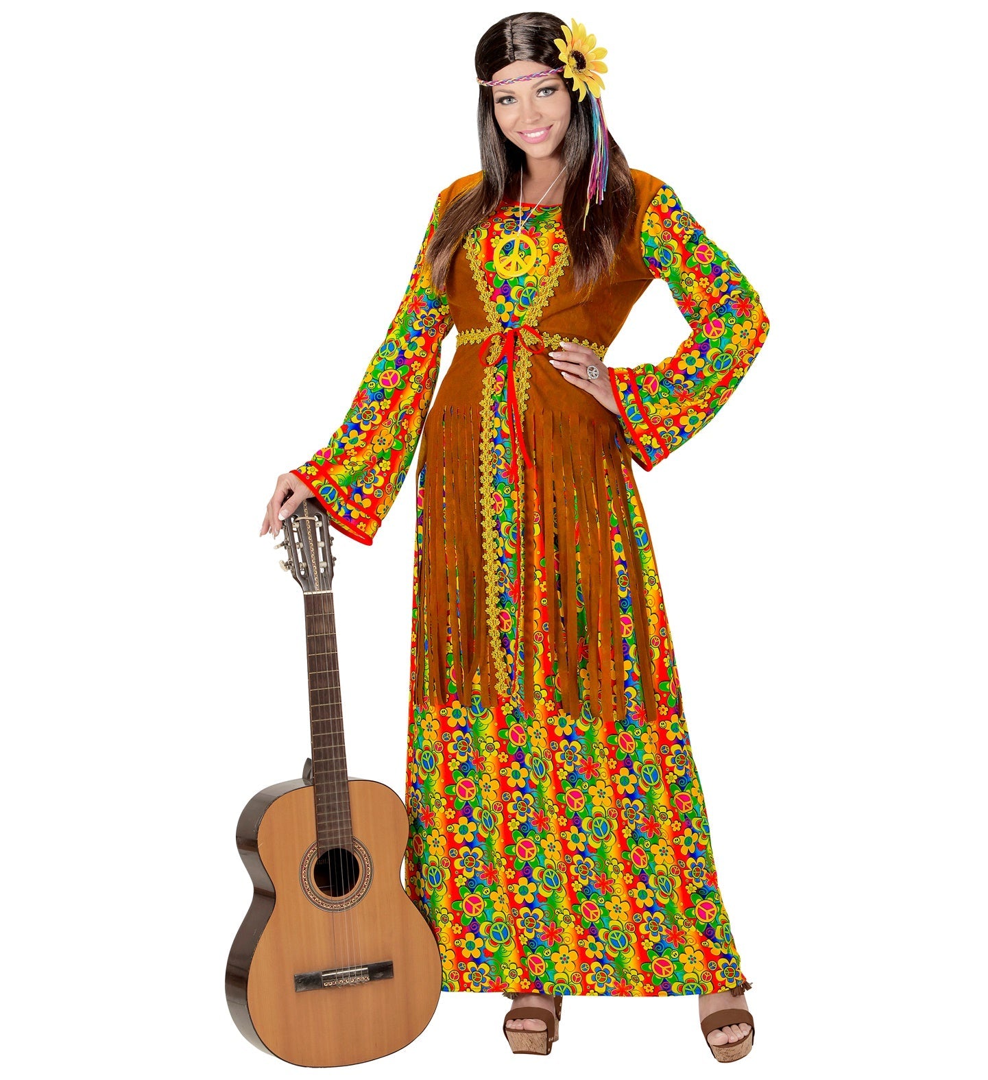 Woman in colorful hippie dress, fringed vest, peace necklace, and holding guitar.