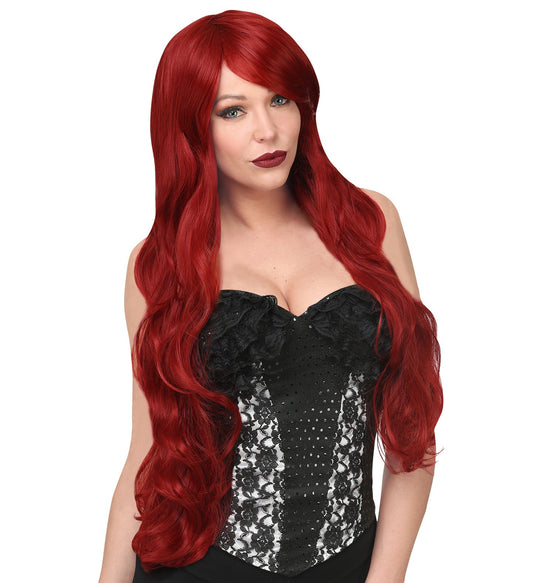 Woman modeling long wavy red wig with premium silicone scalp and black lace corset.