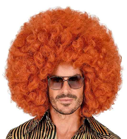 Man in copper giant afro wig with sunglasses on white background.