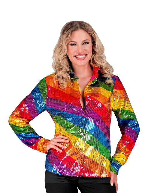 Woman modeling a shimmering rainbow sequin blouse with long sleeves and collar.