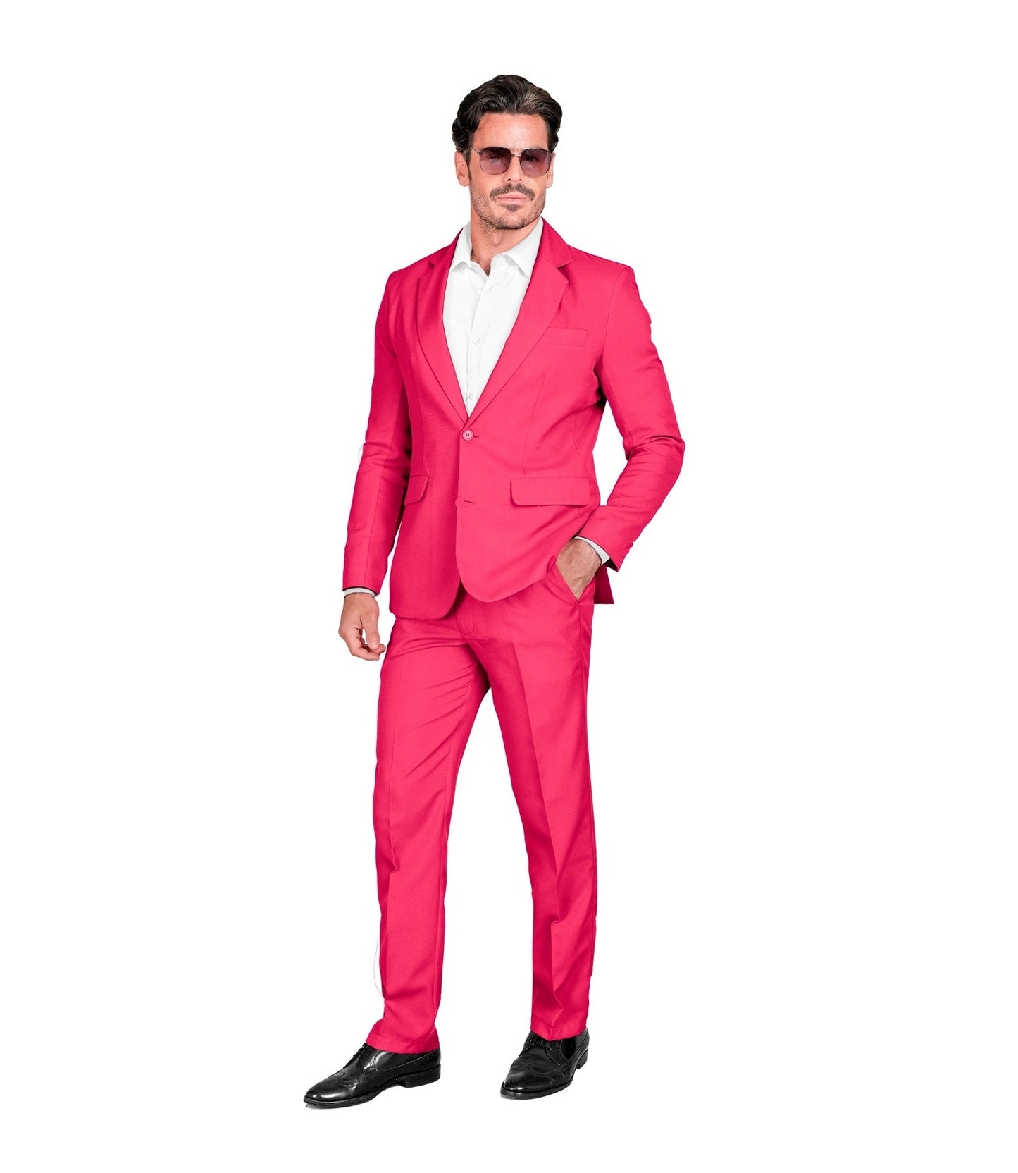 Man in neon pink slim-fit suit with white shirt and black shoes, standing confidently.