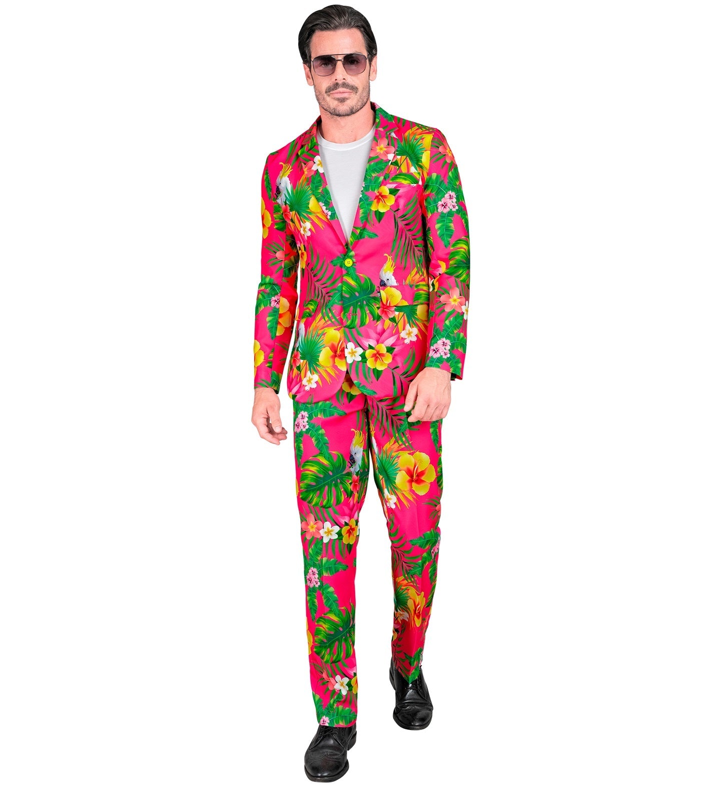 Man in neon Hawaiian print suit with pink, green, and yellow floral pattern.