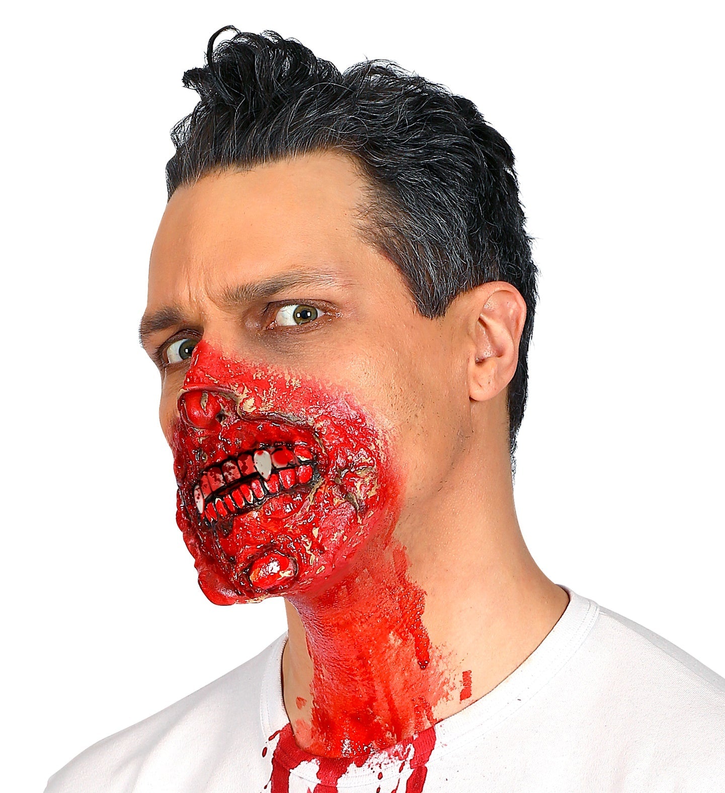 Realistische, knochenweiße Vampirzähne mit Dentalkleber im Sarg aus schwarzem Schaumstoff.