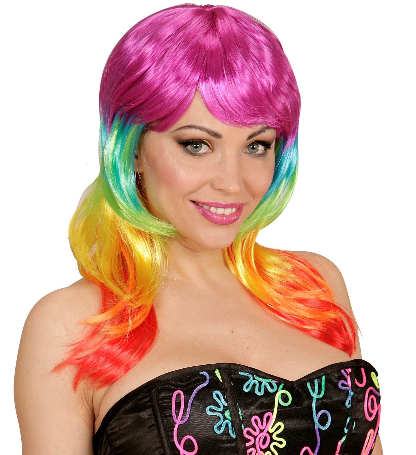 Woman wearing a UV-reactive synthetic wig with rainbow neon gradient from pink to orange.