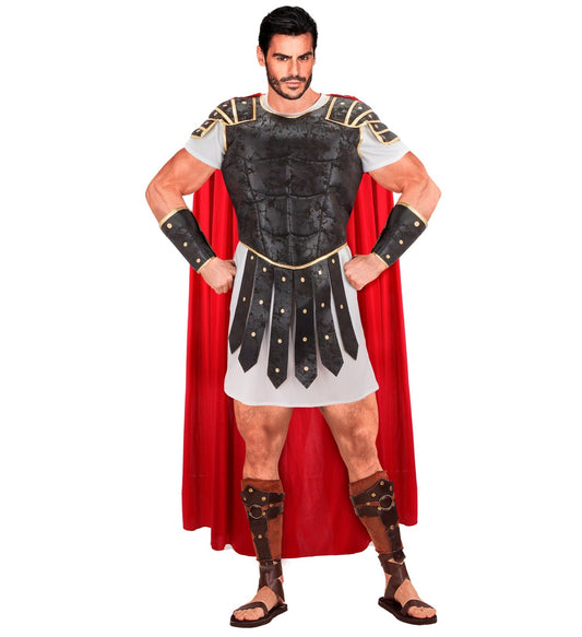 Man in Roman centurion costume with black armor, white tunic, red cape, and leather bracers.