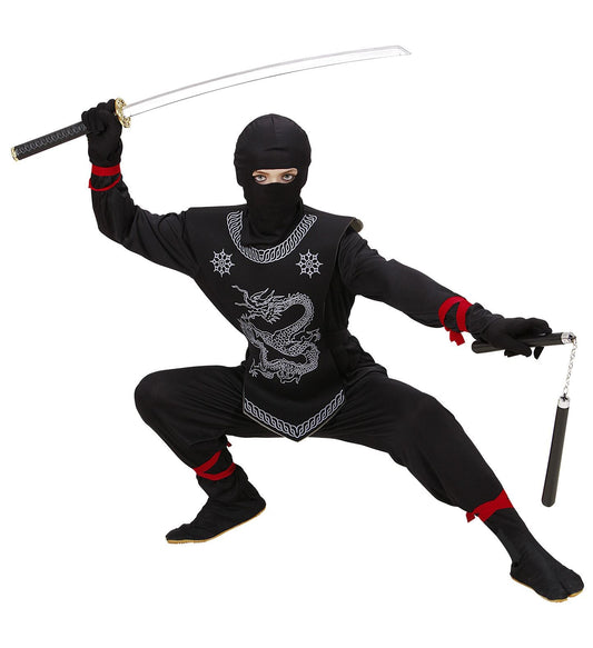 Kind holding black ninja costume with sword, nunchucks, dragon design, and mask.