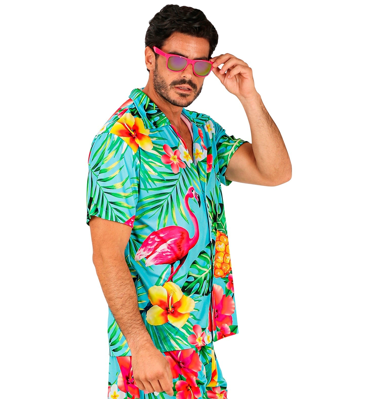Man in vibrant turquoise Hawaiian shirt with pink flamingos, green leaves, and yellow hibiscus flowers.