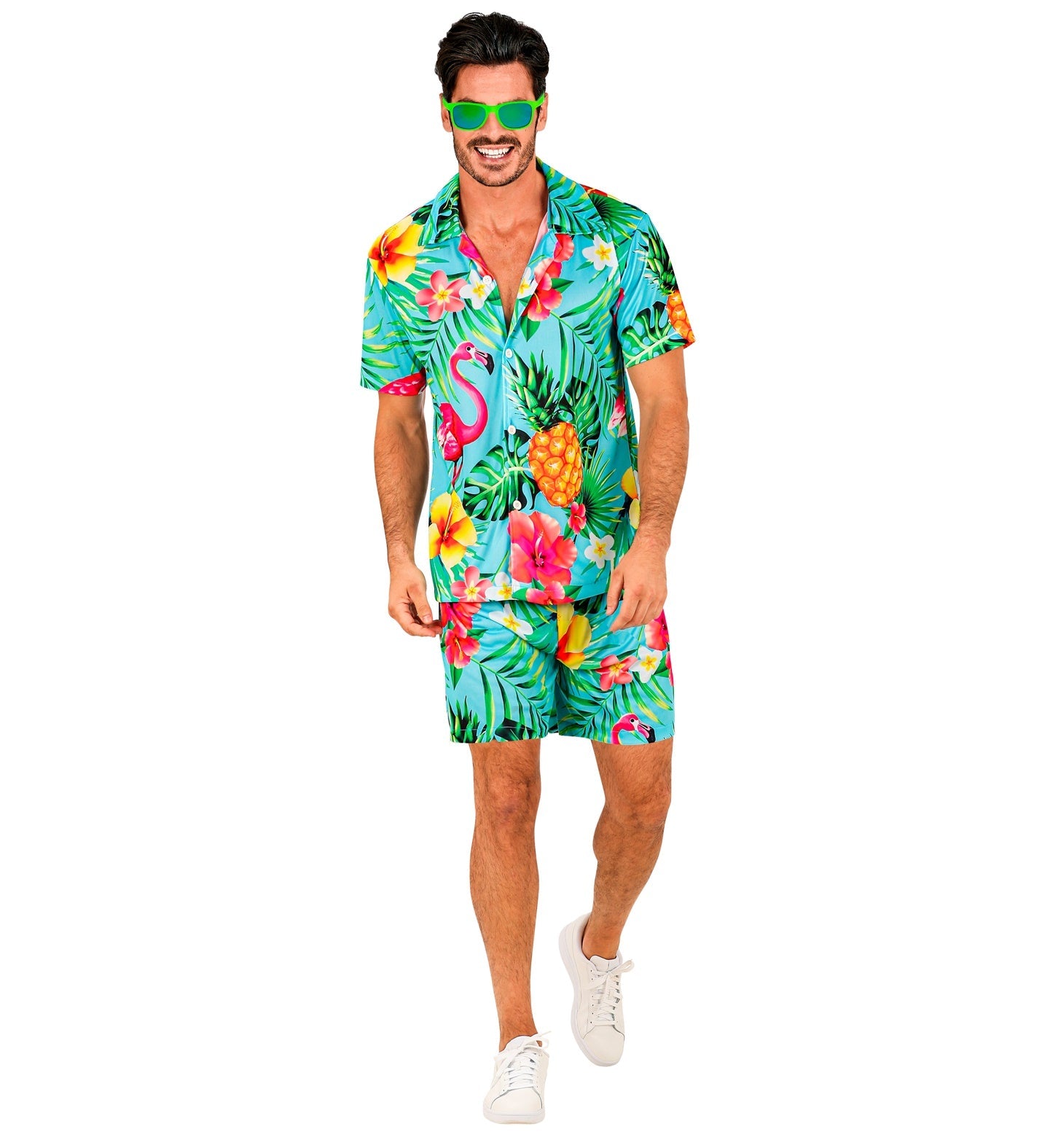Man in turquoise Hawaiian shirt and shorts with flamingo and pineapple prints.