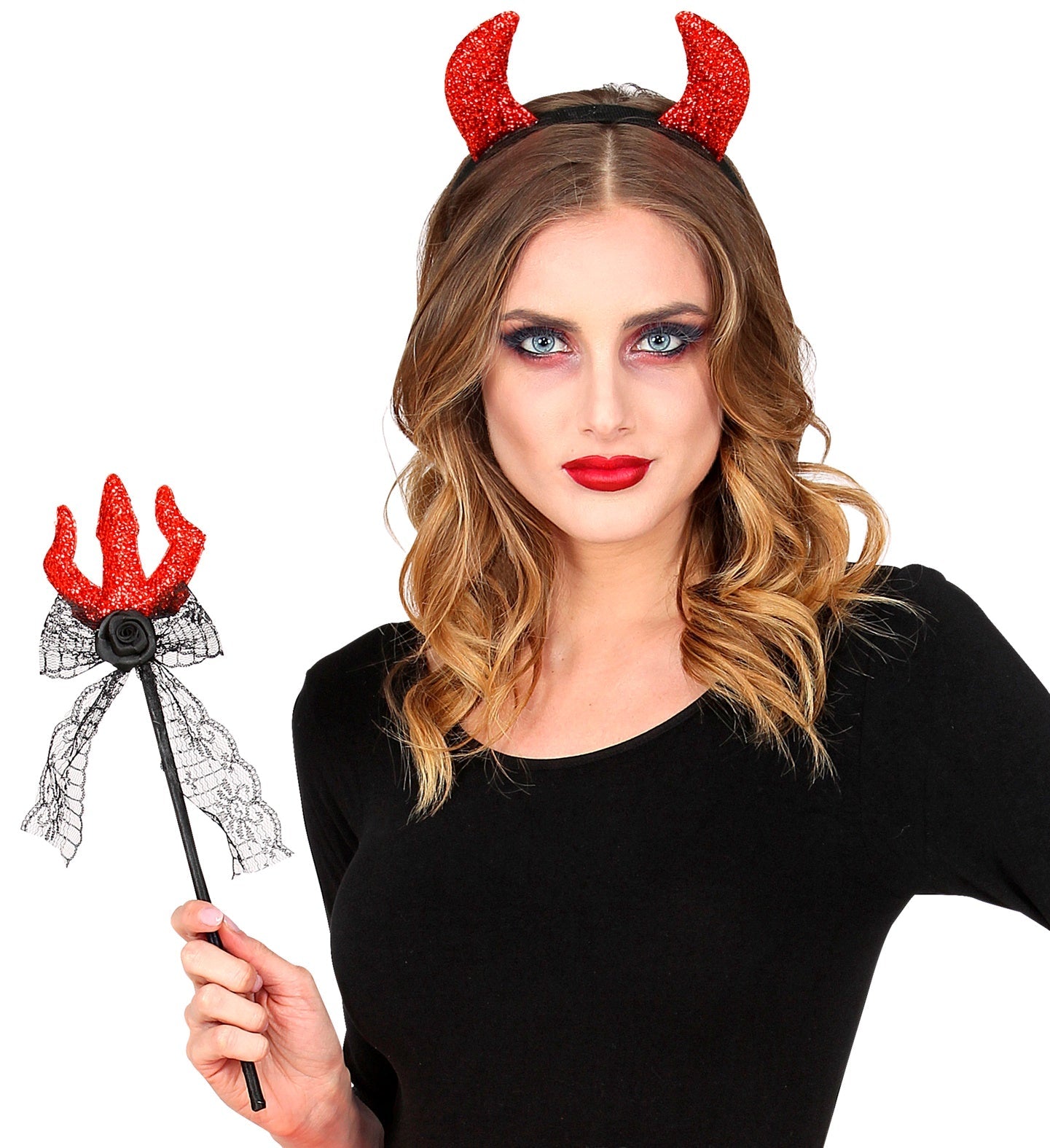 Woman wearing red devil horns headband and holding black trident prop.